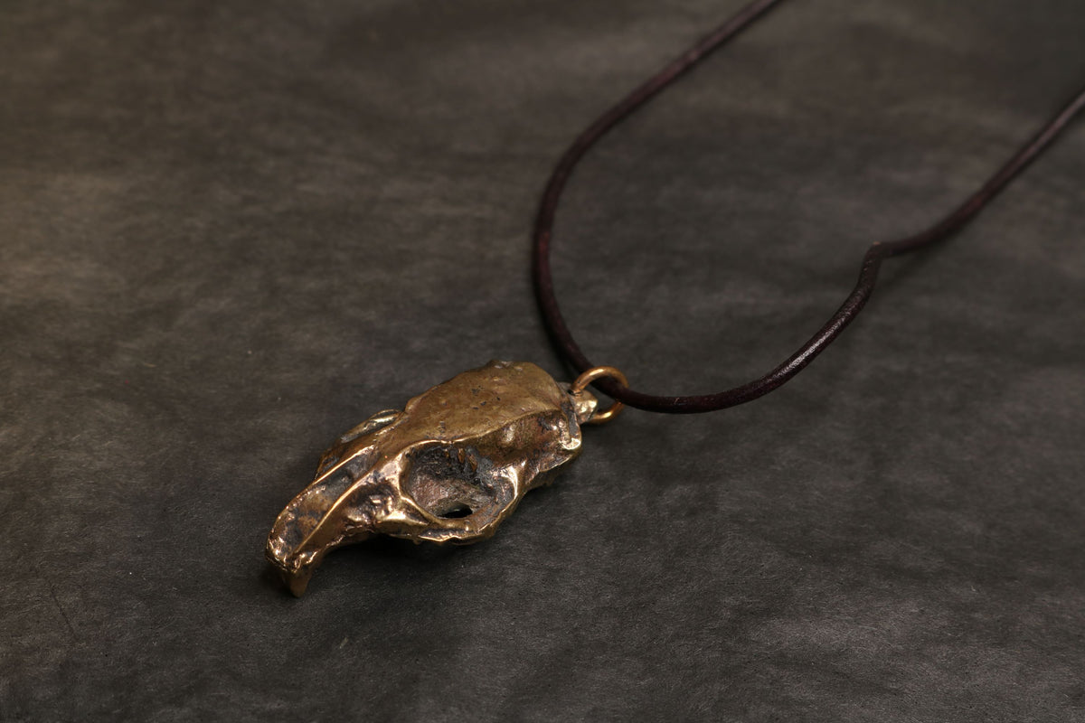 Hand molded bronze RAT SKULL pendant