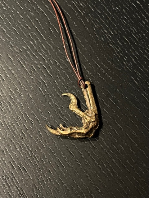 Hand molded bronze CROW CLAW NECKLACE with leather cord