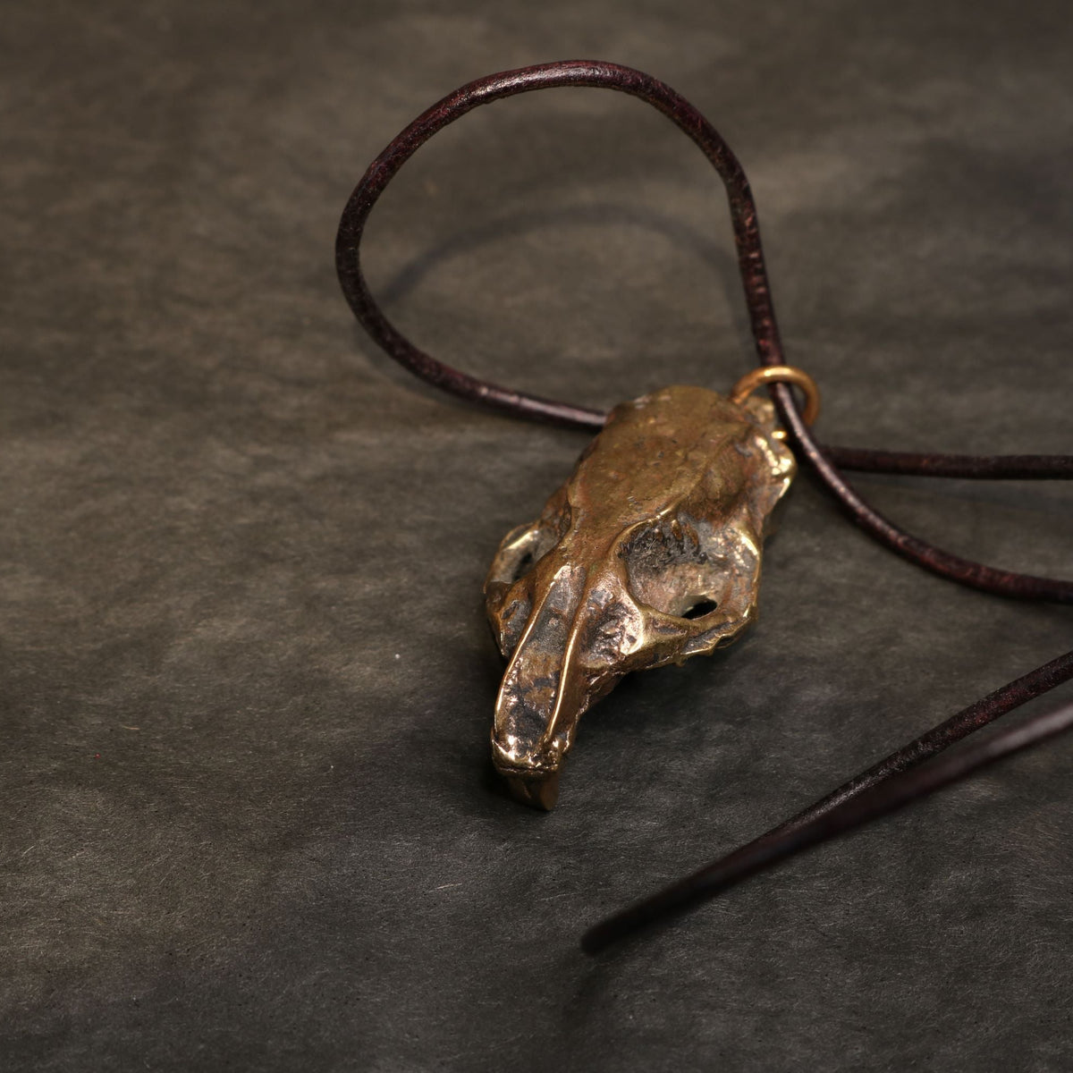 Hand molded bronze RAT SKULL pendant